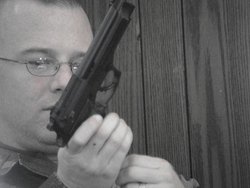 37 - Maj 'Crazy Joe' Gardemal, cleaning the big guns