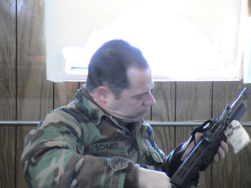 40 - SSG Schmidt cleaning his gun