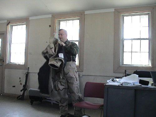 59 - Maj Gardemal dons the New J-LIST Chemical Suit.jpg