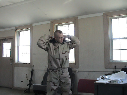 61 - Maj Gardemal dons the New J-LIST Chemical Suit.jpg