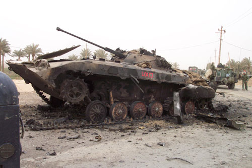 039 - Approching Saddam City, dead tank again